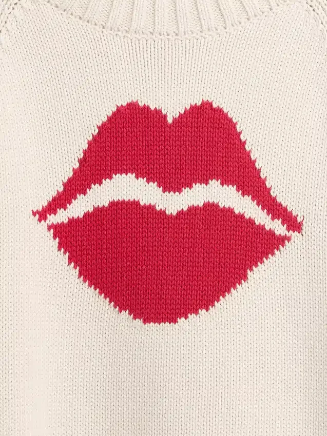 100 % bomullströja med raglanärmar och ”Kiss”-tryck