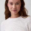 100 % bomullströja med rullkrage