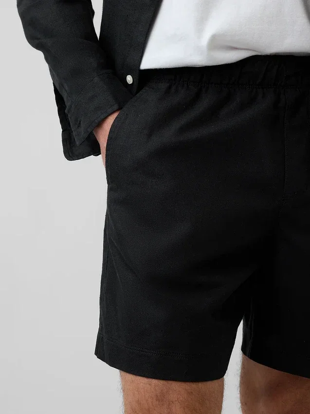 5,5" avslappnade shorts i linneblandning
