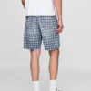 90-talsinspirerade, lösa jeansshorts i rutmönster