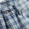 90-talsinspirerade, lösa jeansshorts i rutmönster