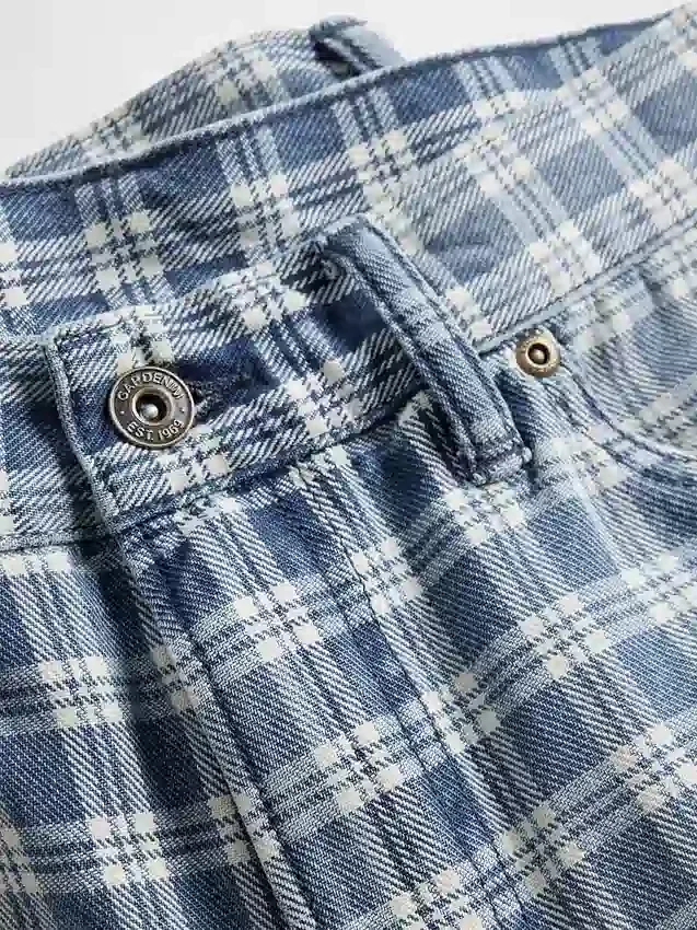 90-talsinspirerade, lösa jeansshorts i rutmönster