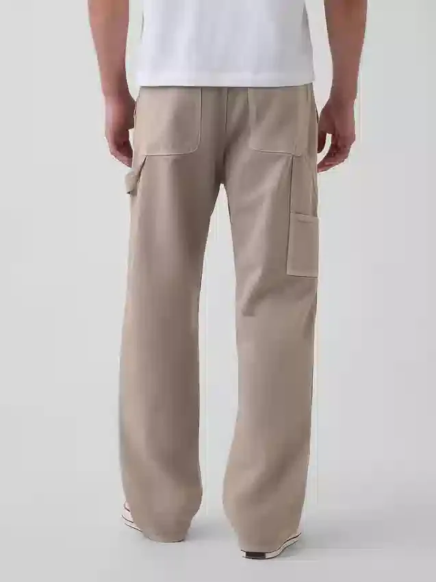 90-talsinspirerade, lösa snickarjeans med dubbla knän