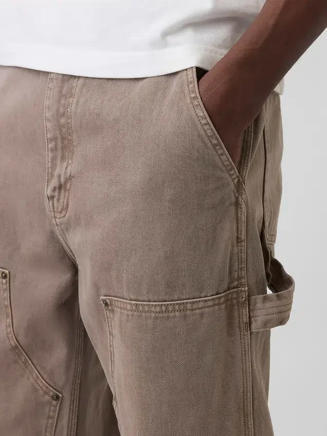 90-talsinspirerade, lösa snickarjeans med dubbla knän
