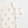 Baby First Favorites bodysuit i ekologisk bomull