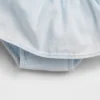 Baby-klädset i denim med rosett