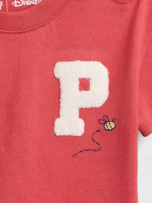 Baby-T-shirt med Nalle Puh-motiv