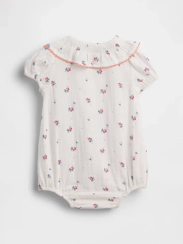 Babybodysuit i bomullsgasväv med blommönster och krage