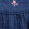 Babybodysuit i bomullsgasväv och denim