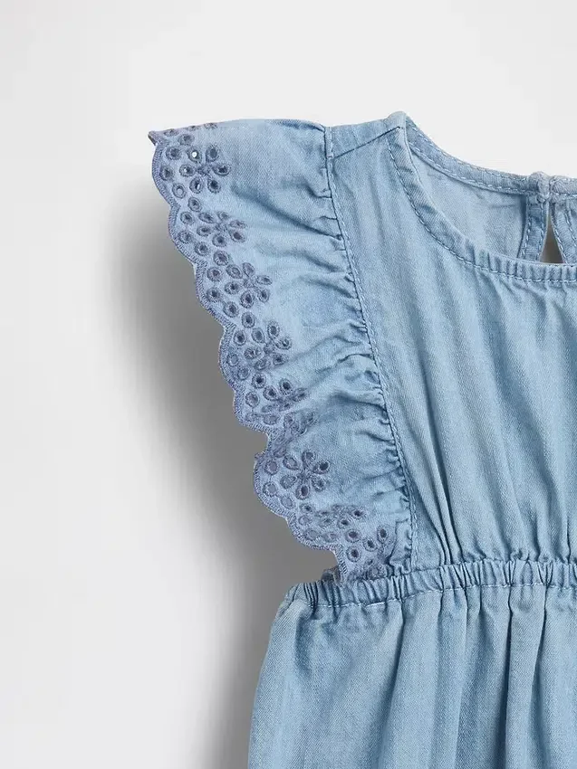 Babyheldress i denim med hålkanter