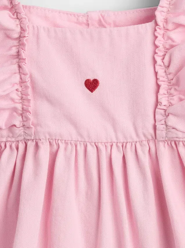 Babyklänning i denim med hjärtmönster