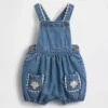 Babyoverall i denim med fickor