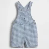 Babyoverall i gingham-denim med björnficka