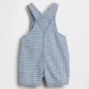 Babyoverall i gingham-denim med björnficka