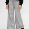 Baggy-jeans för barn med låg midja, rosett och delad fåll