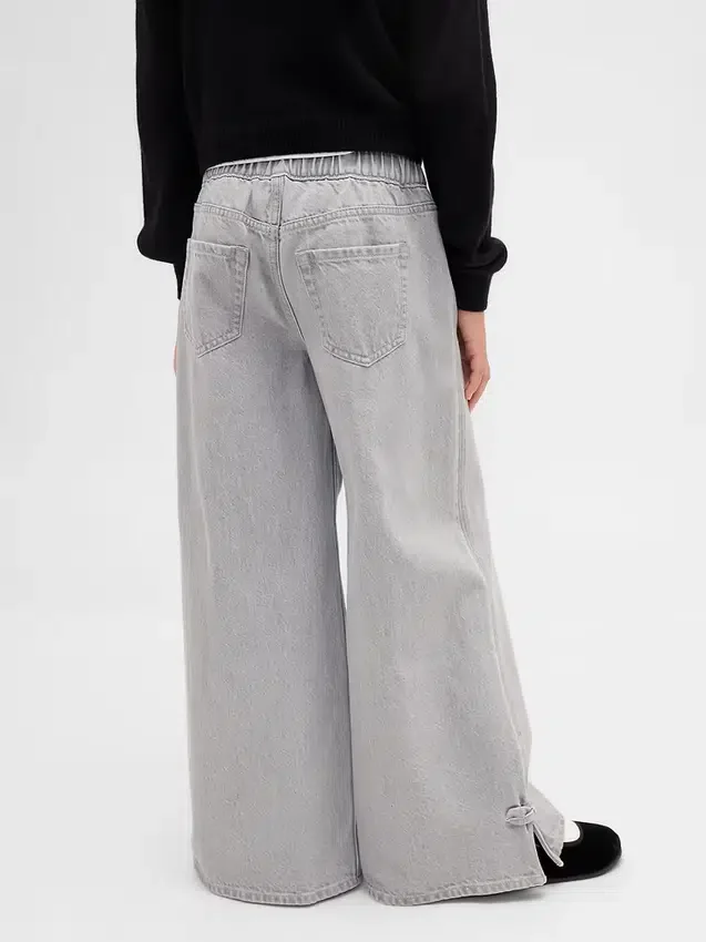 Baggy-jeans för barn med låg midja, rosett och delad fåll