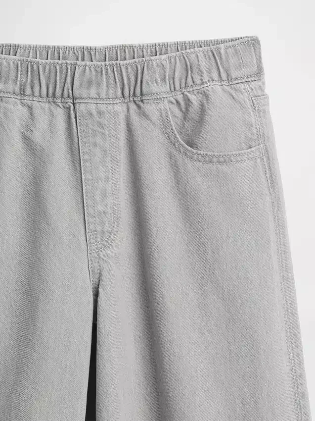 Baggy-jeans för barn med låg midja, rosett och delad fåll