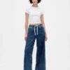Baggy-jeans i stickad denim med medelhög midja
