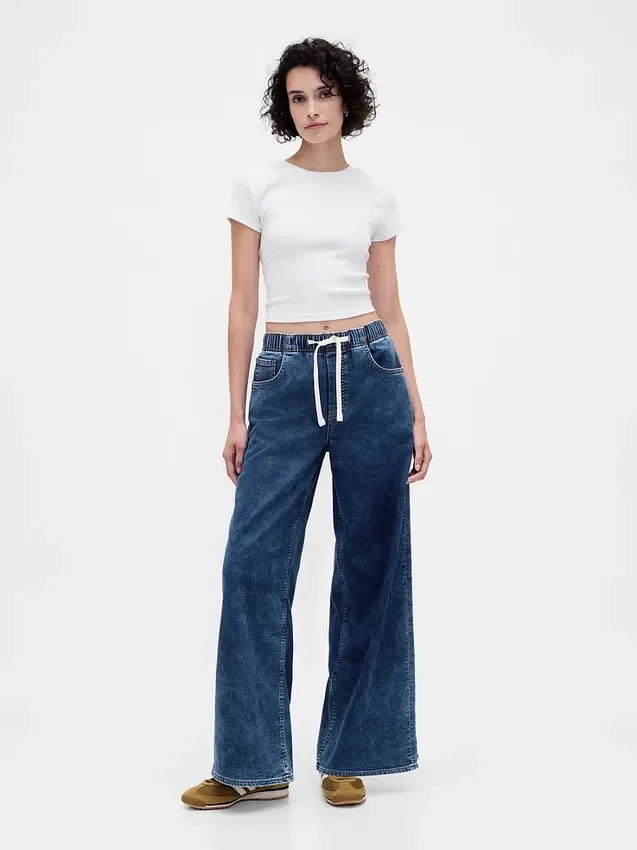 Baggy-jeans i stickad denim med medelhög midja