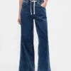 Baggy-jeans i stickad denim med medelhög midja