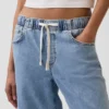 Baggy-Jeans i stickat med medelhög midja