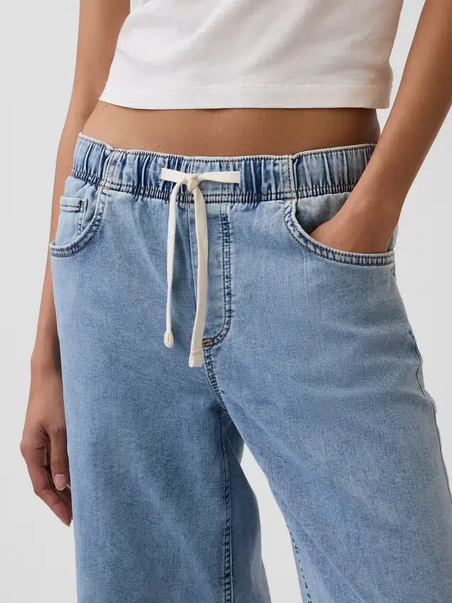 Baggy-Jeans i stickat med medelhög midja
