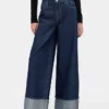 Baggy-jeans med medelhög midja och metalliska uppviktade benslut