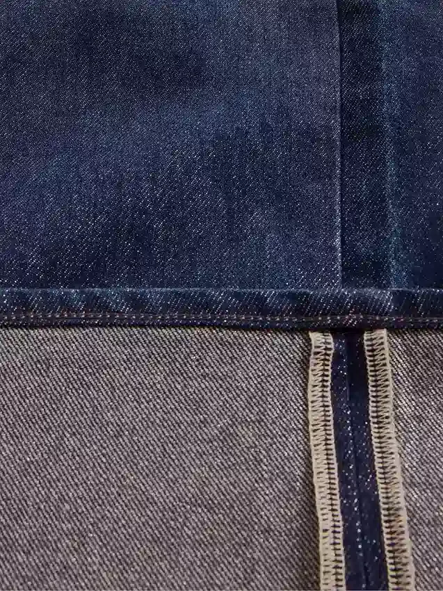Baggy-jeans med medelhög midja och metalliska uppviktade benslut