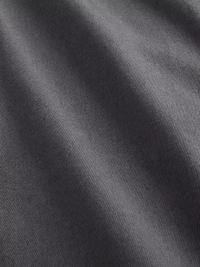 Baggybaggy-byxor i borstad twill med avsmalnande ben