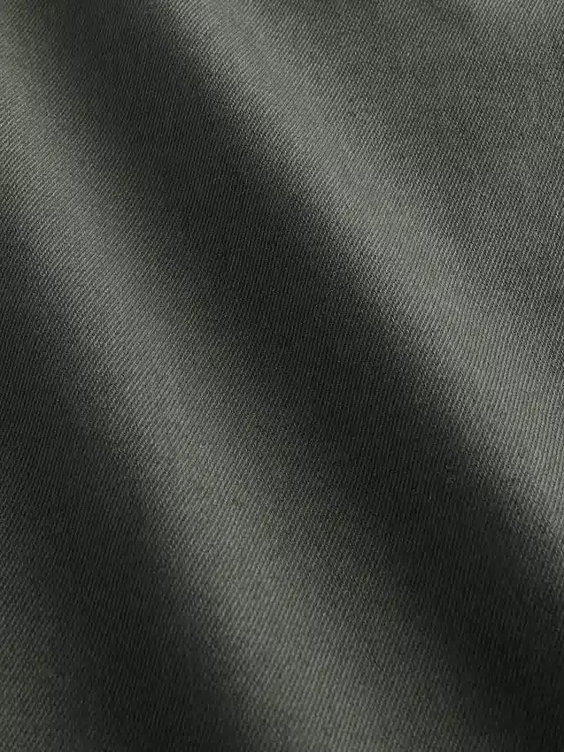 Baggybaggy-byxor i borstad twill med avsmalnande ben