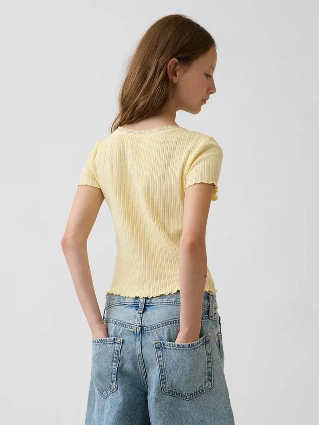 Barn-T-shirt i pointelle-ribb med knappar fram