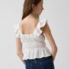 Barn-top med fladdrande ärmar, smockad midja och peplum