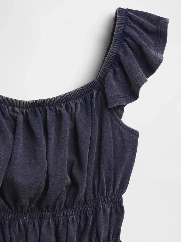 Barn-top med fladdrande ärmar, smockad midja och peplum