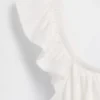 Barn-top med fladdrande ärmar, smockad midja och peplum