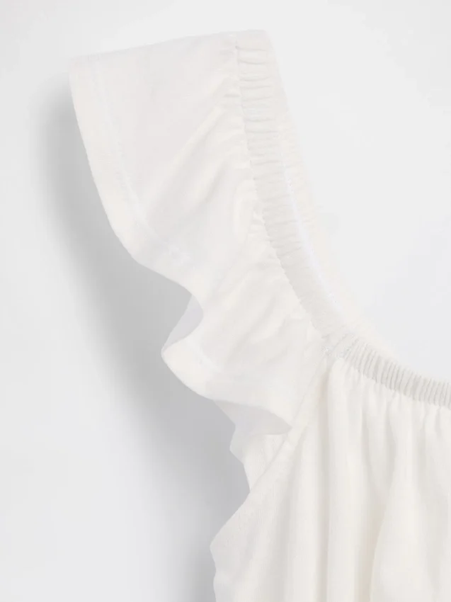 Barn-top med fladdrande ärmar, smockad midja och peplum