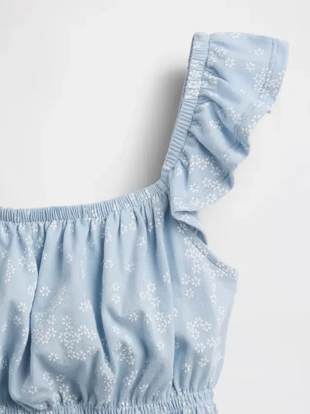Barn-top med fladdrande ärmar, smockad midja och peplum
