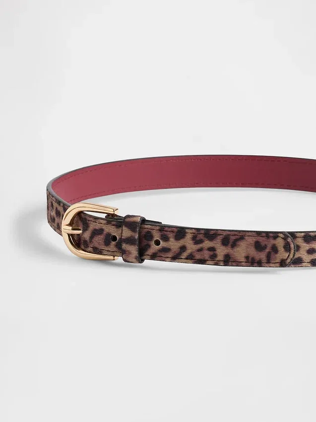 Barnbälten med leopardmönster