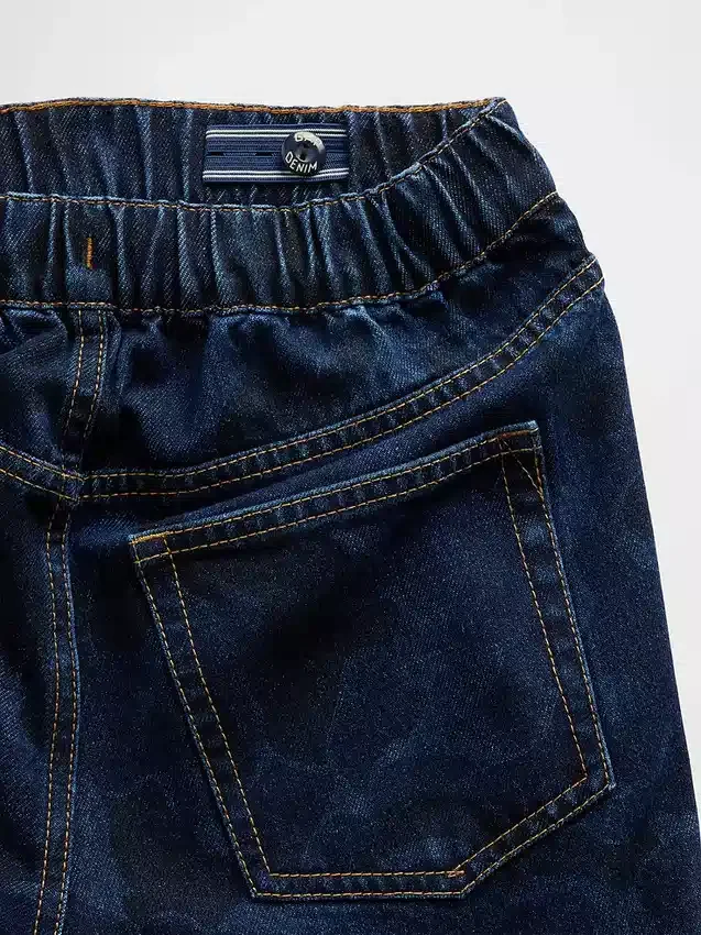 Barnjeans i kamouflage, lös passform