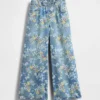 Barnjeans med blommönster i lös passform