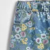 Barnjeans med blommönster i lös passform