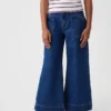 Barnjeans med hög midja, vid ben och ankellängd