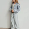 Barnjeans med hög midja, vid ben och ankellängd