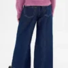 Barnjeans med låg midja, avslappnad passform och metallic-effekt