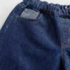 Barnjeans med låg midja, avslappnad passform och metallic-effekt