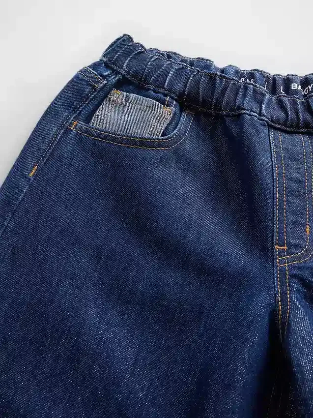 Barnjeans med låg midja, avslappnad passform och metallic-effekt