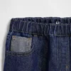 Barnjeans med låg midja, avslappnad passform och metallic-effekt