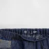 Barnjeans med låg midja, avslappnad passform och metallic-effekt