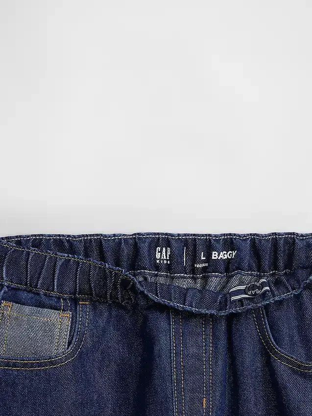 Barnjeans med låg midja, avslappnad passform och metallic-effekt