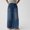 Barnjeans med låg midja, broderade och baggy