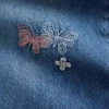Barnjeans med låg midja, broderade och baggy